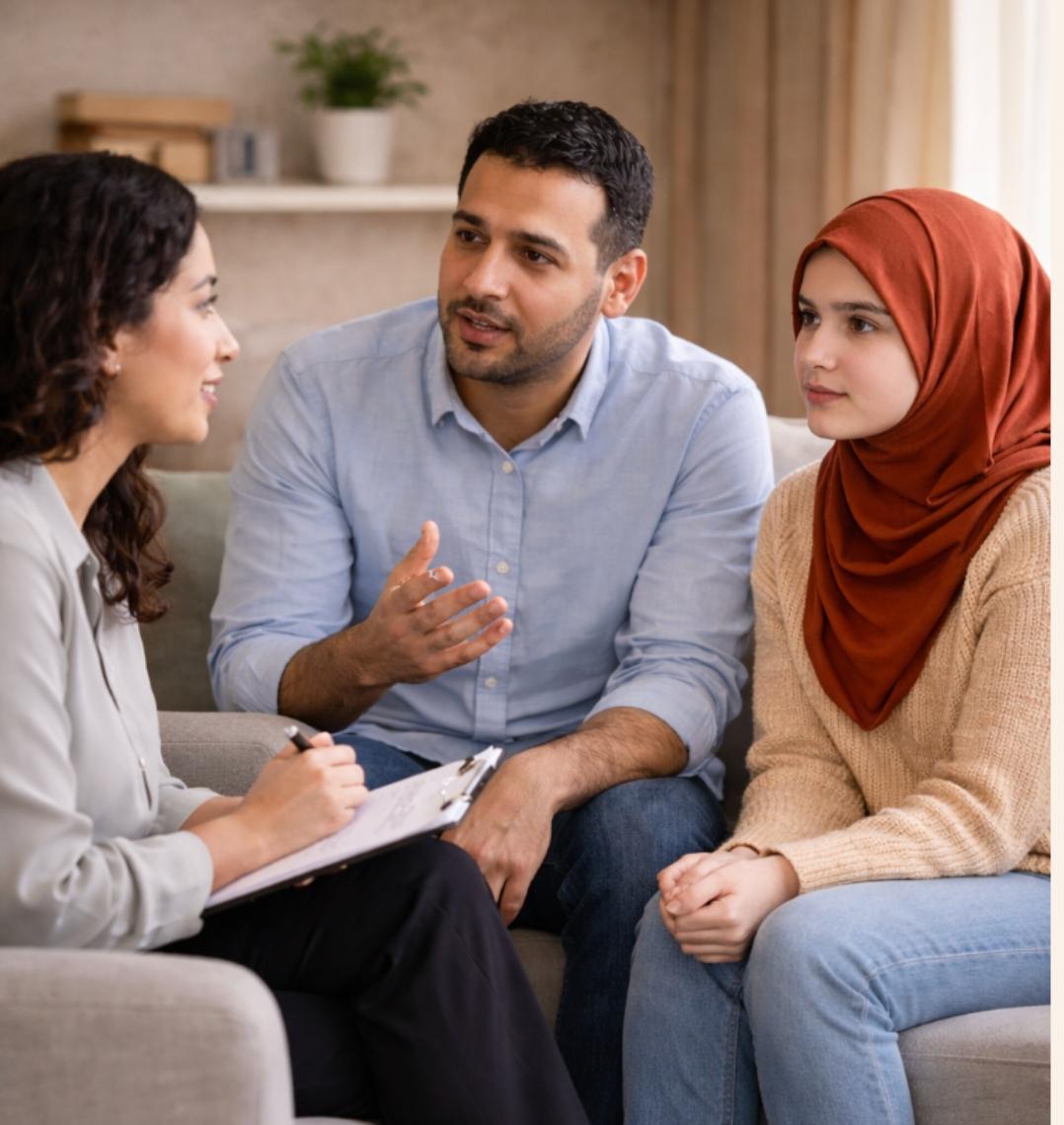 Arabic-speaking family attending a therapy session with a counselor.