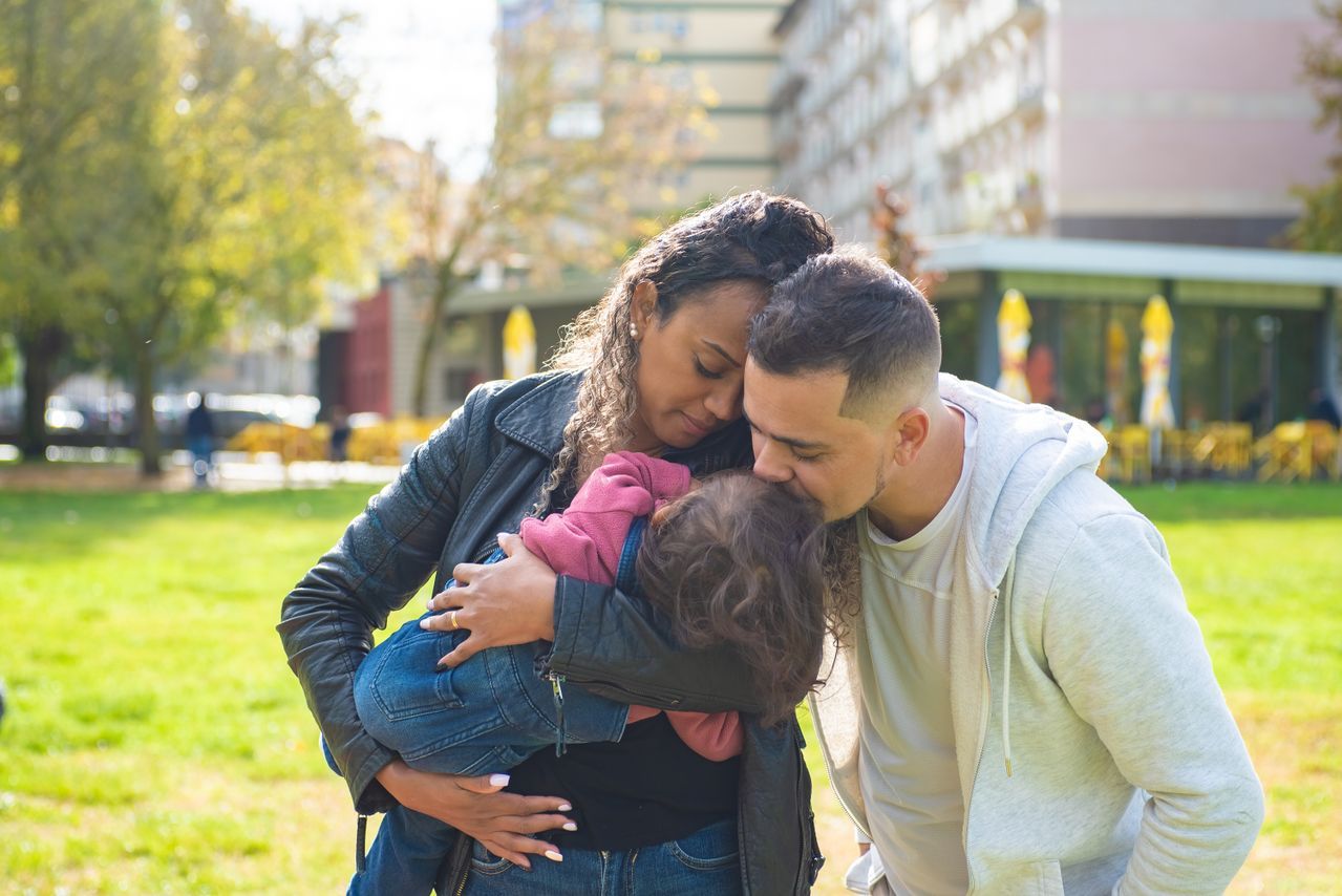 Newcomers to Canada - Husband and wife with a child