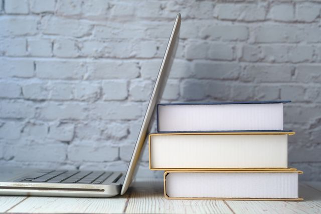 Laptops and Books - to showcase link to the resources pages on Cornerstone website